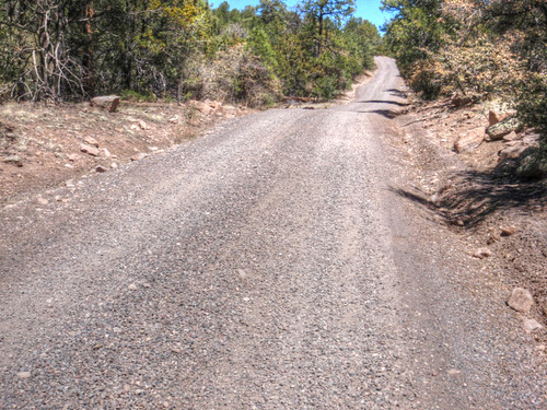 End of about 13-14 miles (20-22 k) of fresh gravel.